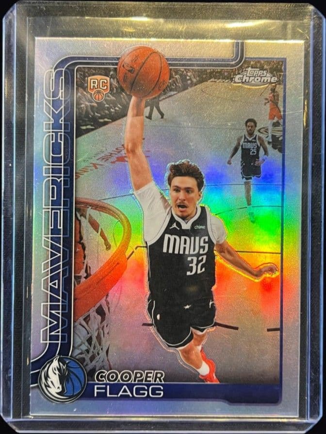 The 2025-26 Topps Chrome Cooper Flagg rookie card, Refractor, showing the rookie card logo and Mavericks jersey.