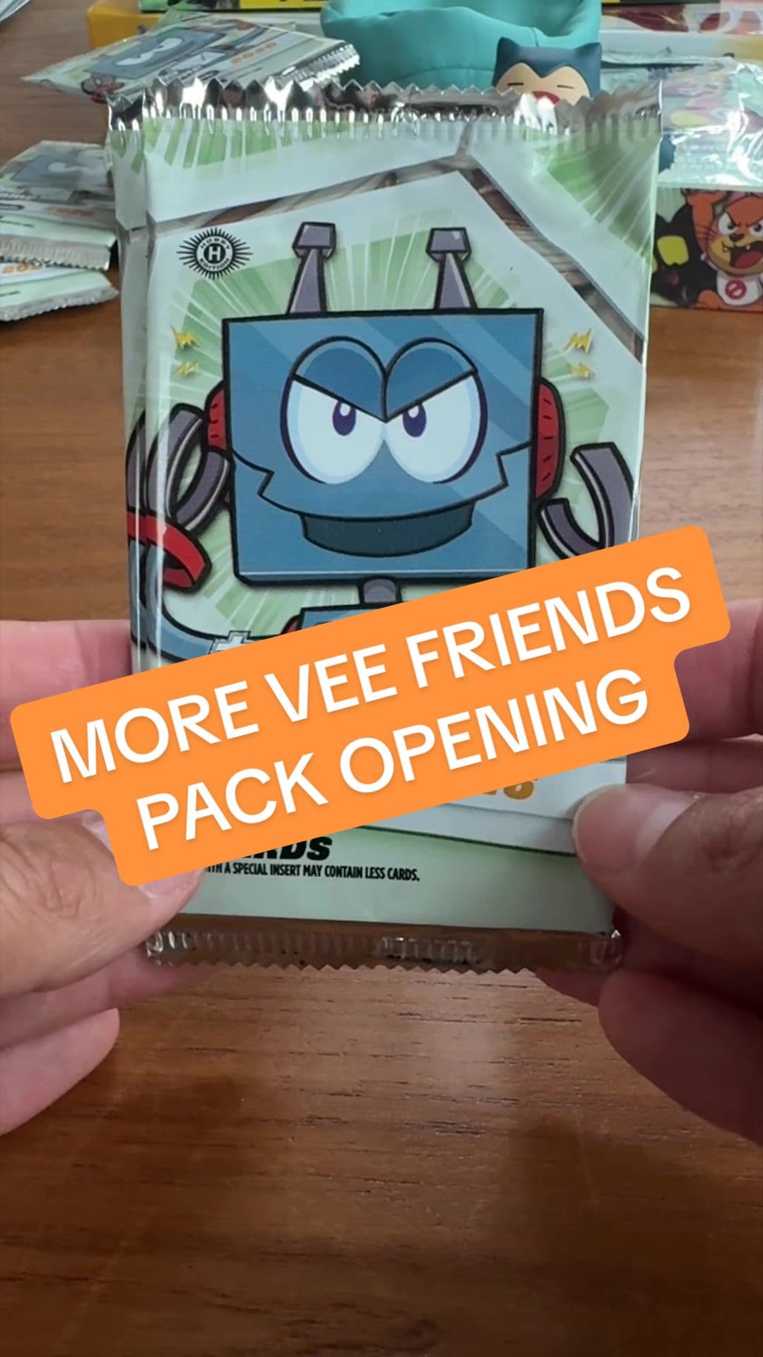 Opening two more packs of Topps Chrome 2026 VeeFriends. So far, thought the cars were fun, but probably not really worth the extreme markup
